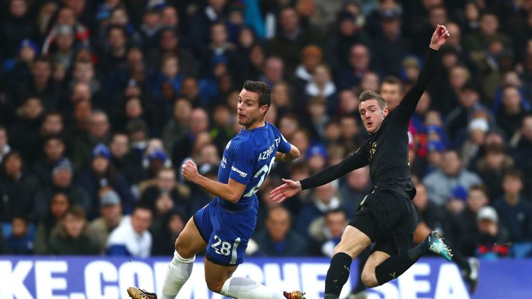 LONDON, ENGLAND - JANUARY 13: Jamie Vardy of Leicester City shoots as Cesar Azpilicueta of Chelsea attempts to block during the Premier League match betwee