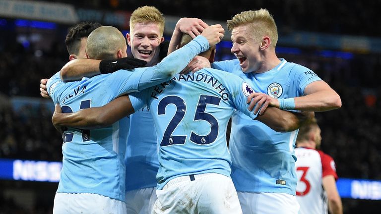 Fernandinho is mobbed by team-mates after giving Manchester City a 1-0 lead at home to West Bromwich Albion
