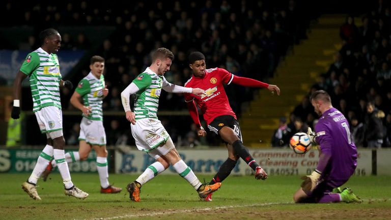 Manchester United's Marcus Rashford (second right) scores against Yeovil