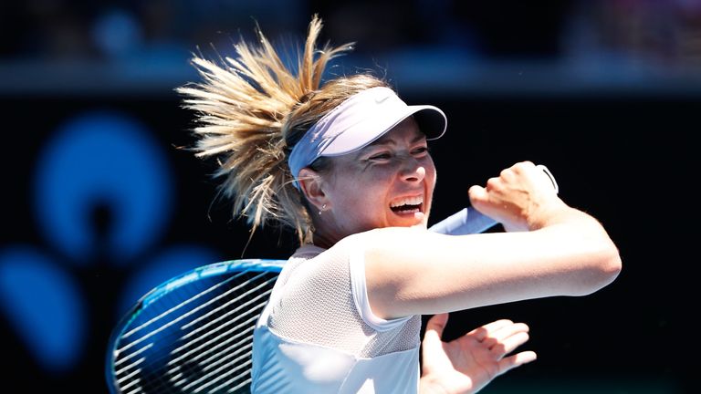 MELBOURNE, AUSTRALIA - JANUARY 16:  Maria Sharapova of Russia plays a forehand in her first round match against Tatjana Maria of Germany on day two of the 
