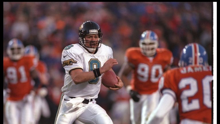 4 Jan 1997:  Quarterback Mark Brunell of the Jacksonville Jaguars moves the ball during a playoff game against the Denver Broncos at Mile High Stadium in D