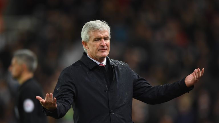 STOKE ON TRENT, ENGLAND - JANUARY 01:  Mark Hughes, Manager of Stoke City reacts during the Premier League match between Stoke City and Newcastle United at
