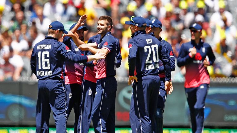 MELBOURNE, AUSTRALIA - JANUARY 14:  Mark Wood of England celebrates after dismissing David Warner of Australia during game one of the One Day International