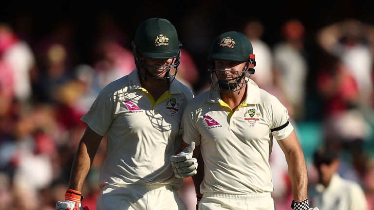 SYDNEY, AUSTRALIA - JANUARY 06:  Mitch Marsh and Shaun Marsh of Australia walk from the ground at stumps  during day three of the Fifth Test match in the 2