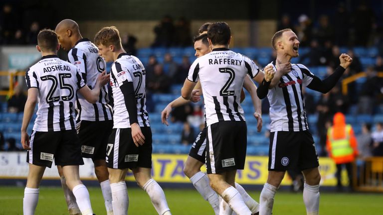 LONDON, ENGLAND - JANUARY 27:  Matt Done of Rochdale AFC celebrates with teammates after scoring his sides second goal during The Emirates FA Cup Fourth Ro