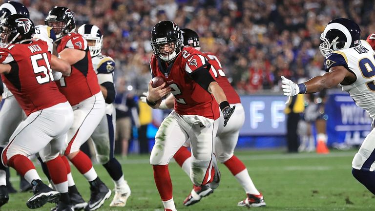 LOS ANGELES, CA - JANUARY 06:  Matt Ryan #2 of the Atlanta Falcons scrambles during the NFC Wild Card Playoff Game against the Los Angeles Rams at the Los 