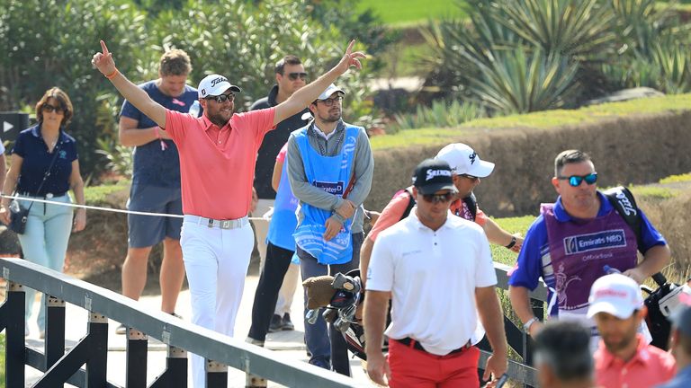 DUBAI, UNITED ARAB EMIRATES - JANUARY 26:  Matthew Southgate of England celebrates as he walks to the 8th tee after making a hole in one on the 7th hole du