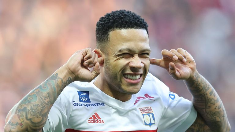 Lyon's Dutch forward Memphis Depay celebrates after scoring a goal during the French L1 football match Nice vs Lyon at The "Allianz Riviera" Stadium in Nic