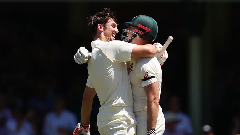 SYDNEY, AUSTRALIA - JANUARY 07:  Mitchell Marsh of Australia (L) celebrates with his brother Shaun Marsh of Australia (R) after scoring a century during da