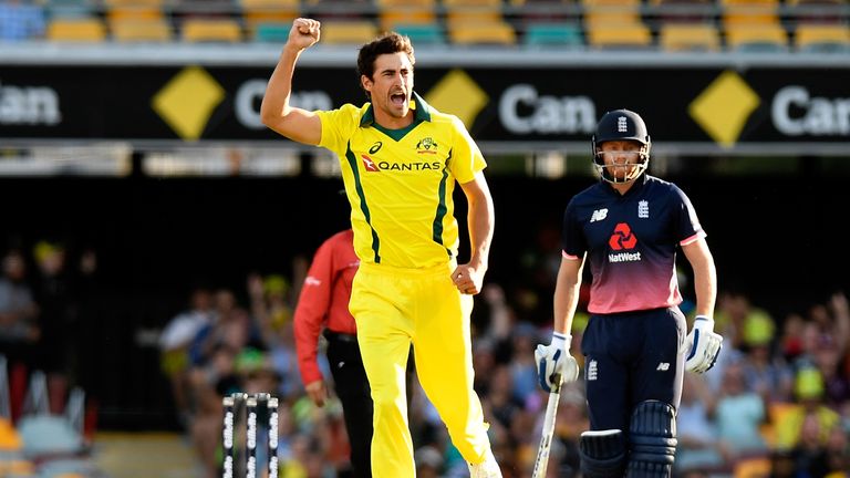 Mitchell Starc of Australia celebrates taking the wicket of Jason Roy of England in the ODI in Brisbane