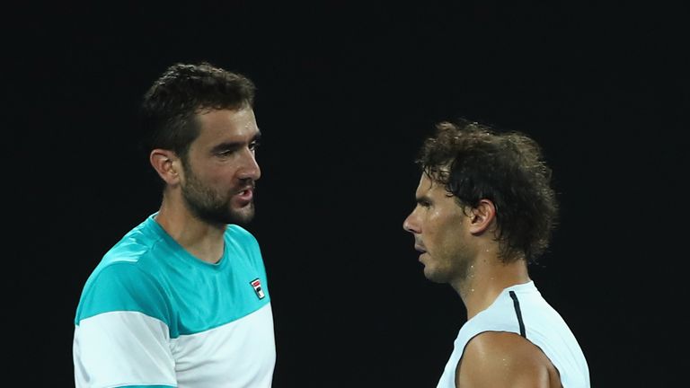 MELBOURNE, AUSTRALIA - JANUARY 23:  Rafael Nadal of Spain shakes hands after retiring injured during the fifth set in his quarter-final match against Marin