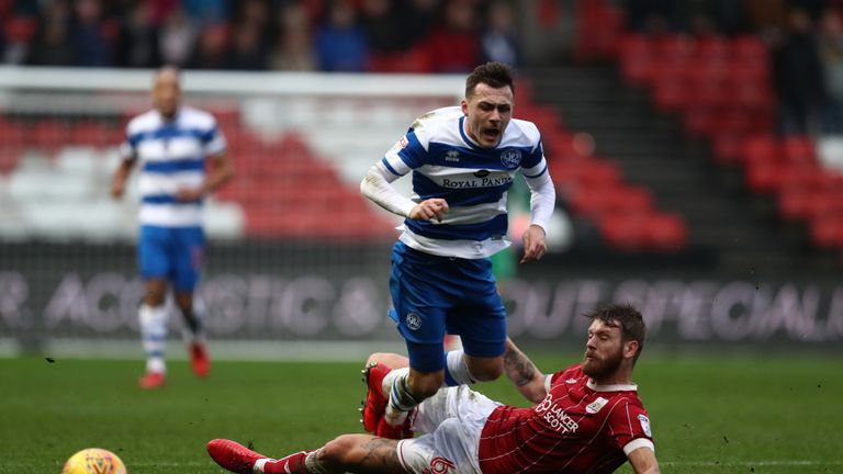 BRISTOL, ENGLAND - JANUARY 27: Nathan Baker of Bristol City tackles Josh Scowen of Queens Park Rangers resulting in Baker receiving a red card during the S