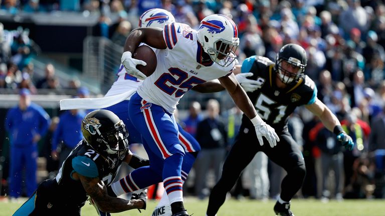 Cornerback A.J. Bouye #21 of the Jacksonville Jaguars tackles running back LeSean McCoy #25 of the Buffalo Bills
