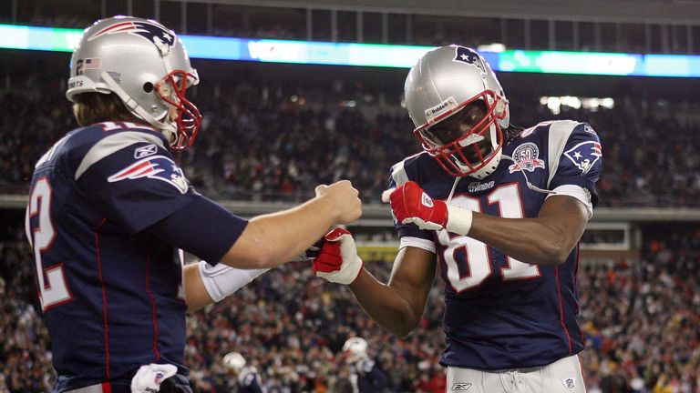 Randy Moss (R) caught 23 touchdown passes from Tom Brady in 2007
