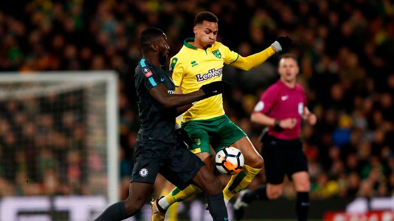 Norwich City's Josh Murphy (R) tangles with Chelsea's Antonio Rudiger (L) during the English FA Cup third round tie at Carrow Road