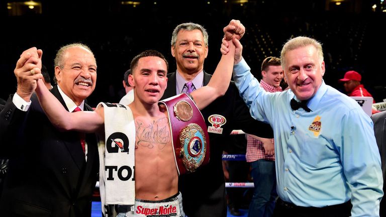 Oscar Valdez of Mexico celebrates a 12th round unanimous decision over Miguel Marriaga of Colombia during the WBO Featherweight World title.