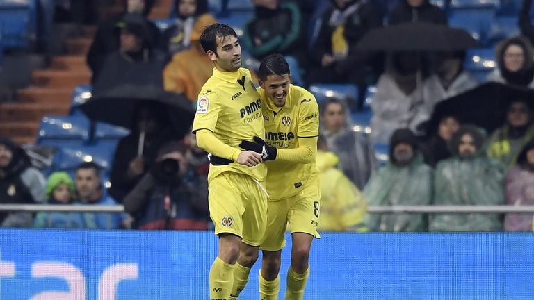 Villarreal's Spanish midfielder Pablo Fornals (R) celebrates with Villarreal's Spanish midfielder Manuel Trigueros Munoz after scoring a goal during the Sp