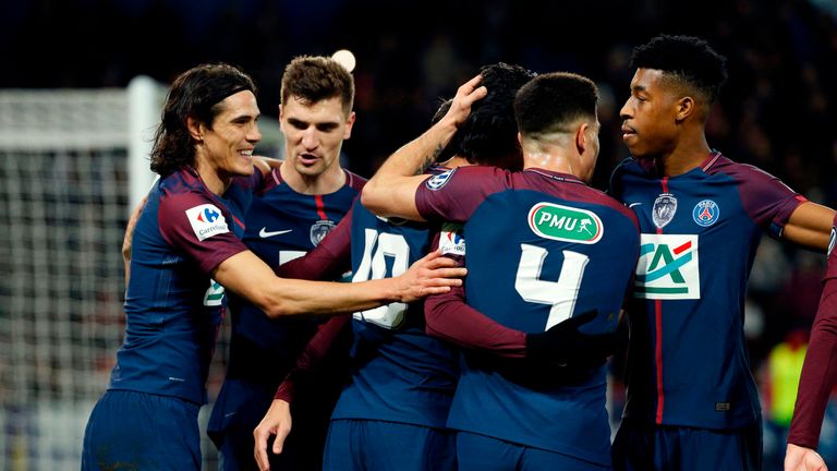 Paris Saint-Germain's Argentinian midfielder Javier Pastore (C) celebrates with teammates after scoring a goal during the French Cup round of 16 football m