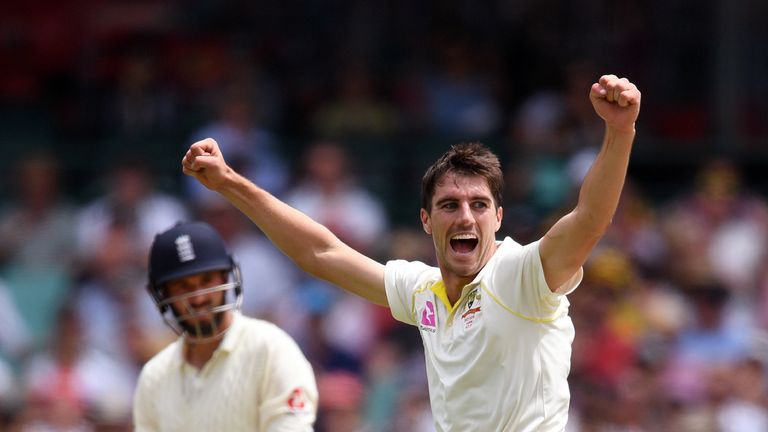 Australia's Pat Cummins (R) celebrates dismissing England batsman James Vince (L) on the first day of the fifth Ashes Test