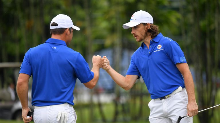 KUALA LUMPUR, MALAYSIA - JANUARY 12:  Tommy Fleetwood celebrates with Paul Casey of Europe during the fourballs matches on day one of the 2018 EurAsia Cup 