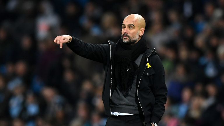 Pep Guardiola gestures during the Carabao Cup Semi-Final First Leg match between Manchester City and Bristol City