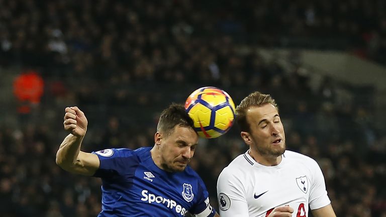 Phil Jagielka challenges Harry Kane during the Premier League match at Wembley Stadium