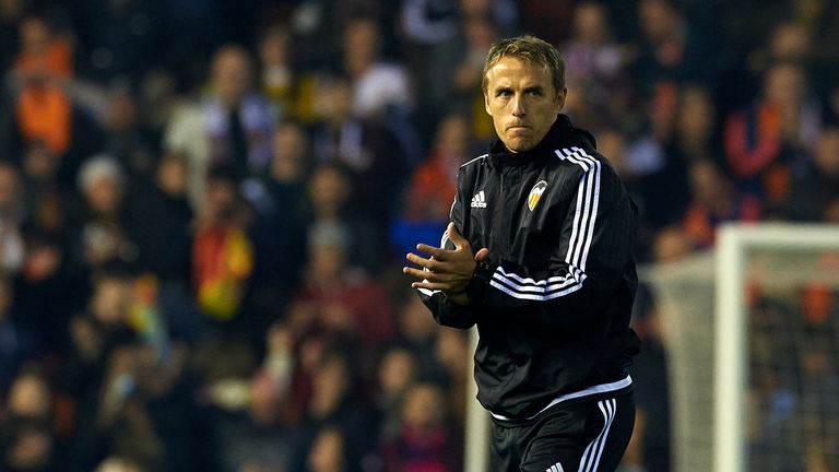 VALENCIA, SPAIN - DECEMBER 05:  Valencia CF assistant coach Phil Neville celebrates at the end of the La Liga match between Valencia CF and FC Barcelona at