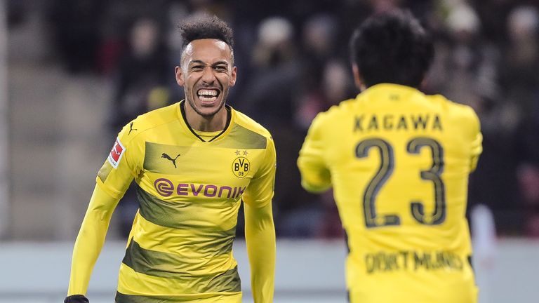 Pierre-Emerick Aubameyang celebrates with team-mate 
Shinji Kagawa after scoring his team's second goal