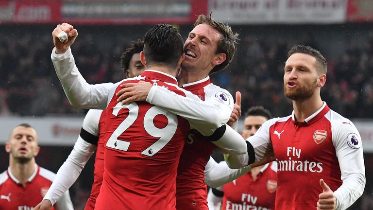 Arsenal defender Nacho Monreal celebrates with Granot Xhaka (29) after scoring the opening goal of the game