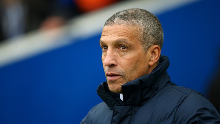 Chris Hughton looks on prior to kick-off in the Premier League match against Chelsea at the Amex Stadium