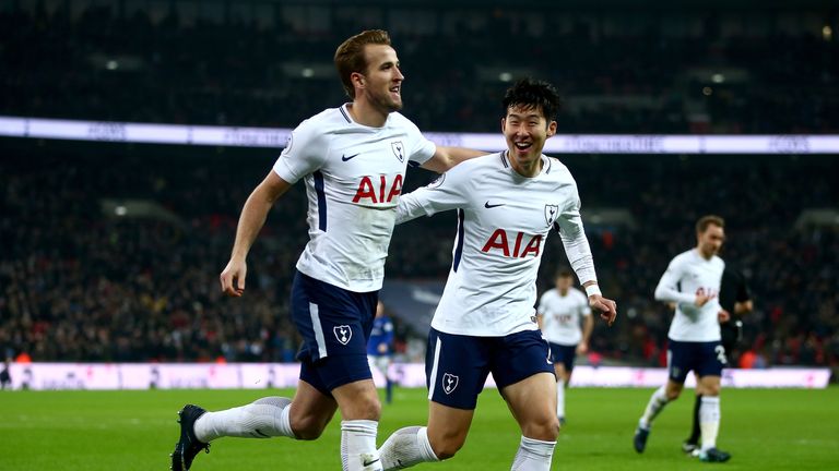 Harry Kane celebrates with team-mate Heung-Min Son after doubling Tottenham's lead