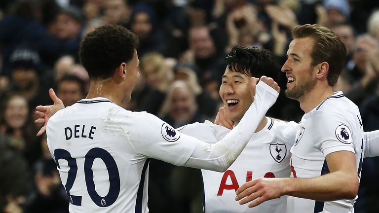 Heung-Min Son celebrates with Dele Alli and Harry Kane after scoring against Everton at Wembley Stadium