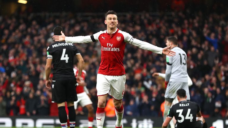 Laurent Koscielny celebrates after scoring his Arsenal's third goal against Crystal Palace