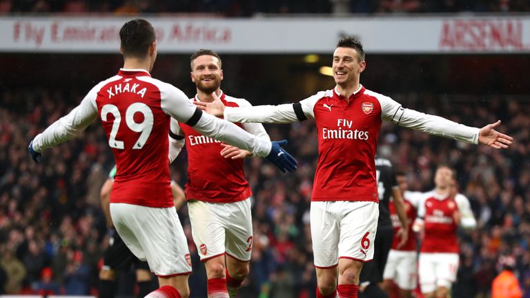 Laurent Koscielny celebrates his goal with Granit Xhaka