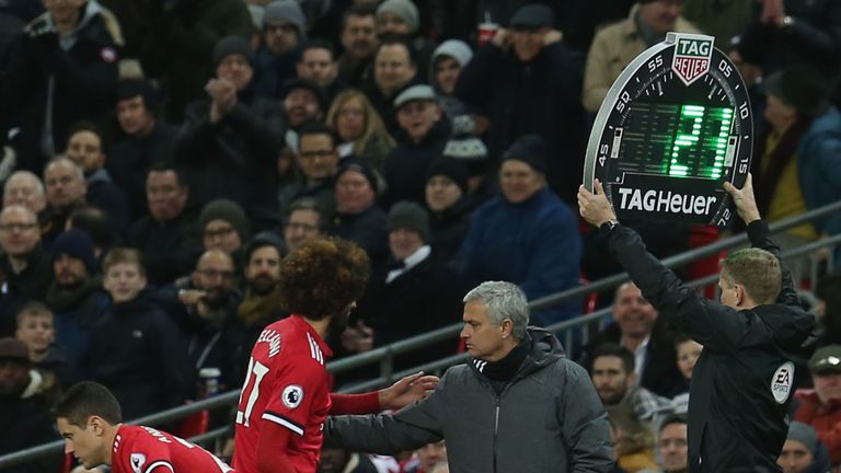 Marouane Fellaini is replaced by Ander Herrera during the Premier League match between Tottenham Hotspur and Manchester United at Wembley Stadium