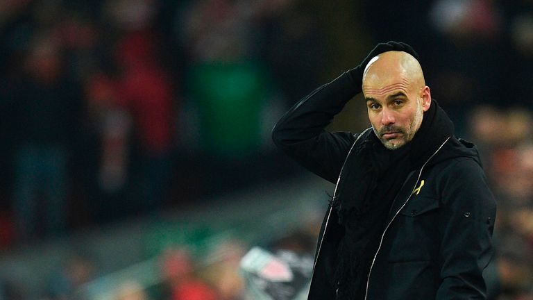 Pep Guardiola reacts on the touchline during the Premier League match between Liverpool and Manchester City at Anfield