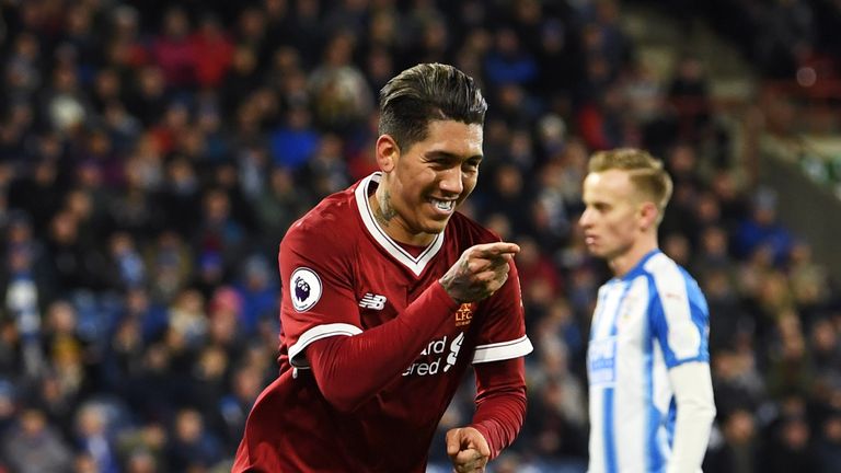 Roberto Firmino celebrates after doubling Liverpool's lead at the John Smith's Stadium