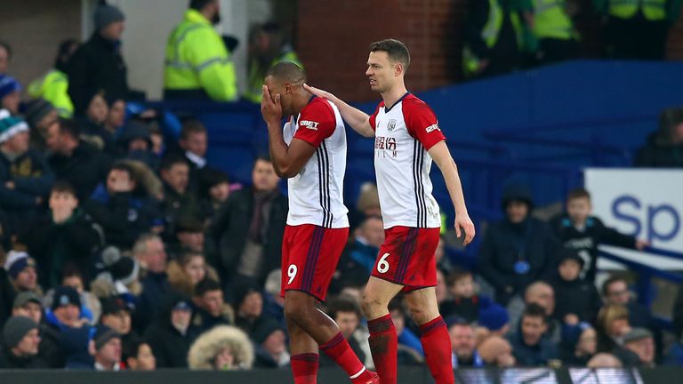 A visibly upset Salomon Rondon is consoled by Jonny Evans following a collision that resulted in injury to James McCarthy (not pictured)