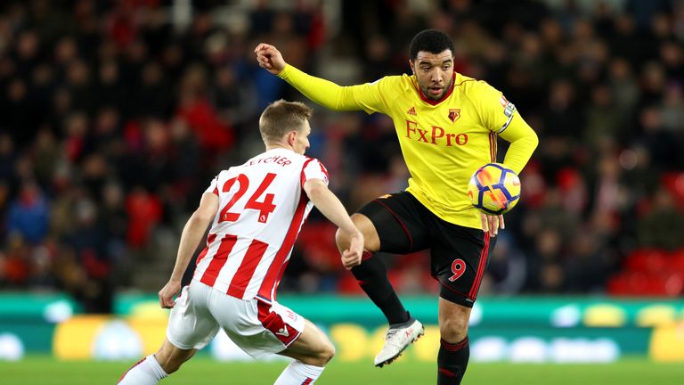 Troy Deeney is put under pressure by Darren Fletcher