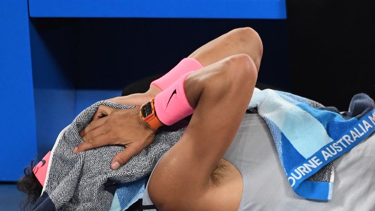 Rafael Nadal receives medical attention during his men's singles quarter-final against Marin Cilic at the 2018 Australian Open