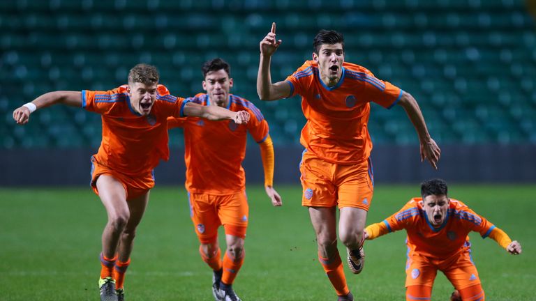 Valencia's Rafa Mir leads the celebrations as they defeat Celtic on penalties during a UEFA Youth Champions League match on February 10, 2016