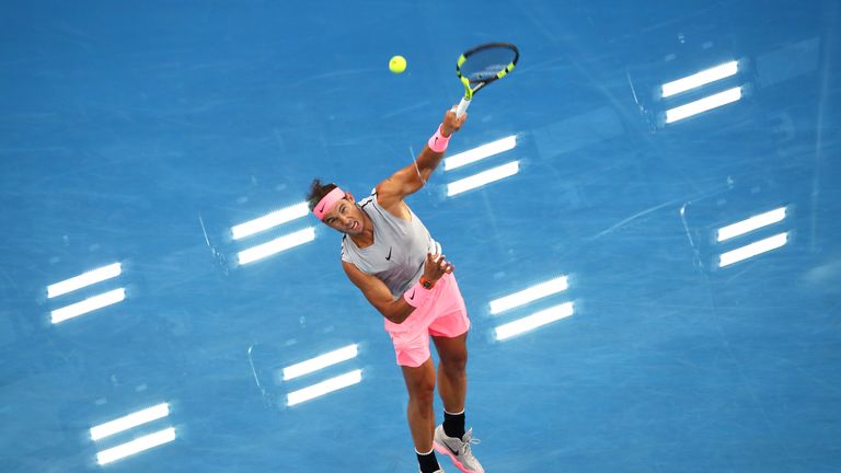 Rafael Nadal serves during his first round match at the 2018 Australian Open