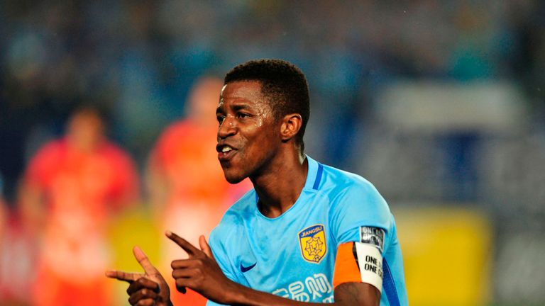 Ramires Santos of Jiangsu FC celebrates after scoring a goal during the AFC Champions League group stage football match against Jeju United FC in Nanjing, 