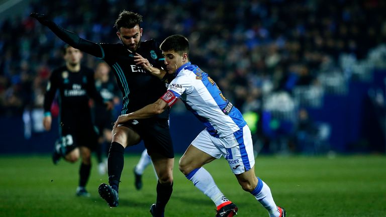 LEGANES, SPAIN - JANUARY 18:  Borja Mayoral (L) of Real Madrid CF is tackled Unai Bustinza (R) of Deportivo Leganes during the Copa del Rey quarter final f