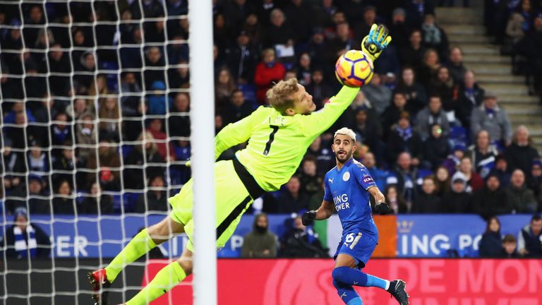 Riyad Mahrez scores the opening goal during the Premier League match between Leicester City and Huddersfield Town