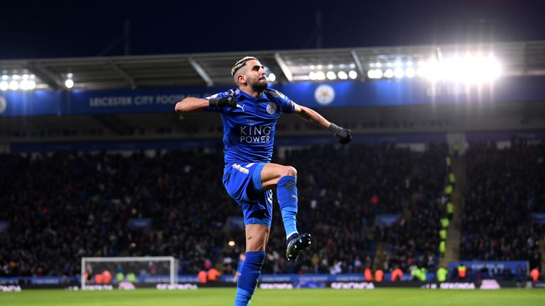Riyad Mahrez of Leicester City celebrates after scoring his side's second goal against Huddersfield