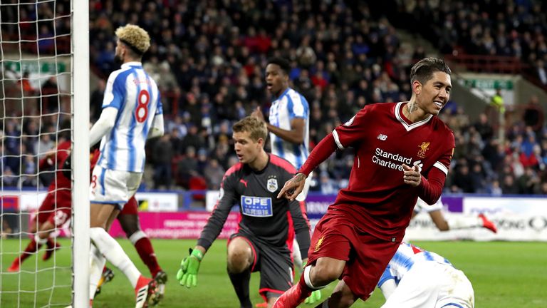Roberto Firmino celebrates as he doubles Liverpool's lead