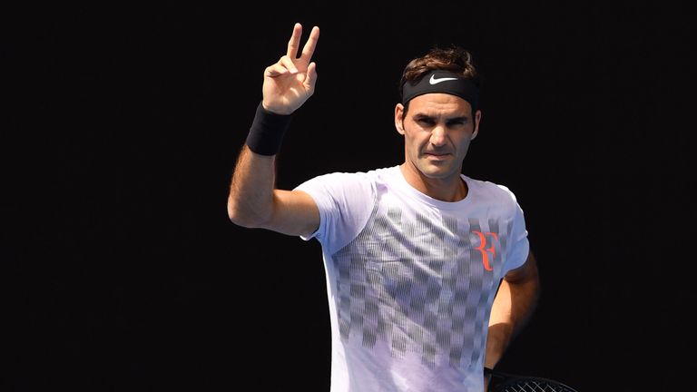 Roger Federer of Switzerland gestures during a tennis training session ahead of the Australian Open in Melbourne