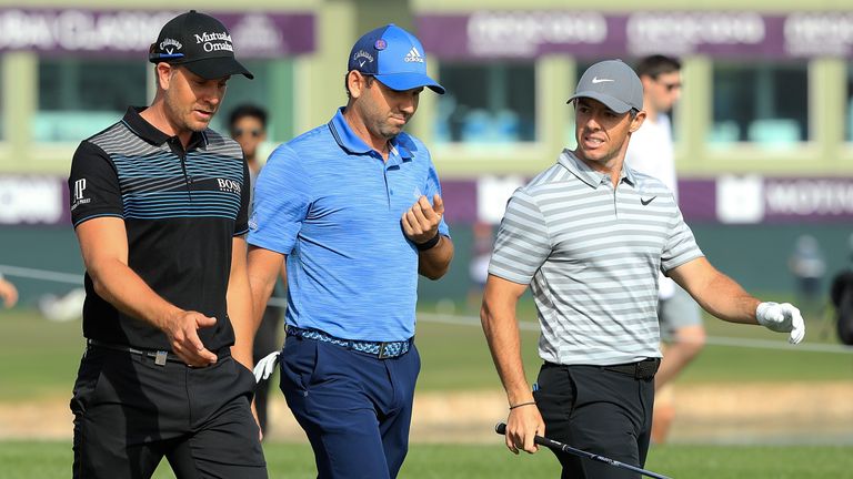 DUBAI, UNITED ARAB EMIRATES - JANUARY 25:  Henrik Stenson of Sweden (L), Sergio Garcia of Spain (C) and Rory McIlroy of Northern Ireland (R) walk up the 17