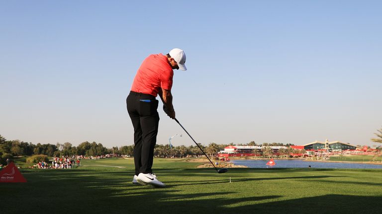 Rory McIlroy tees off on the 18th during the third round of the Abu Dhabi Championship